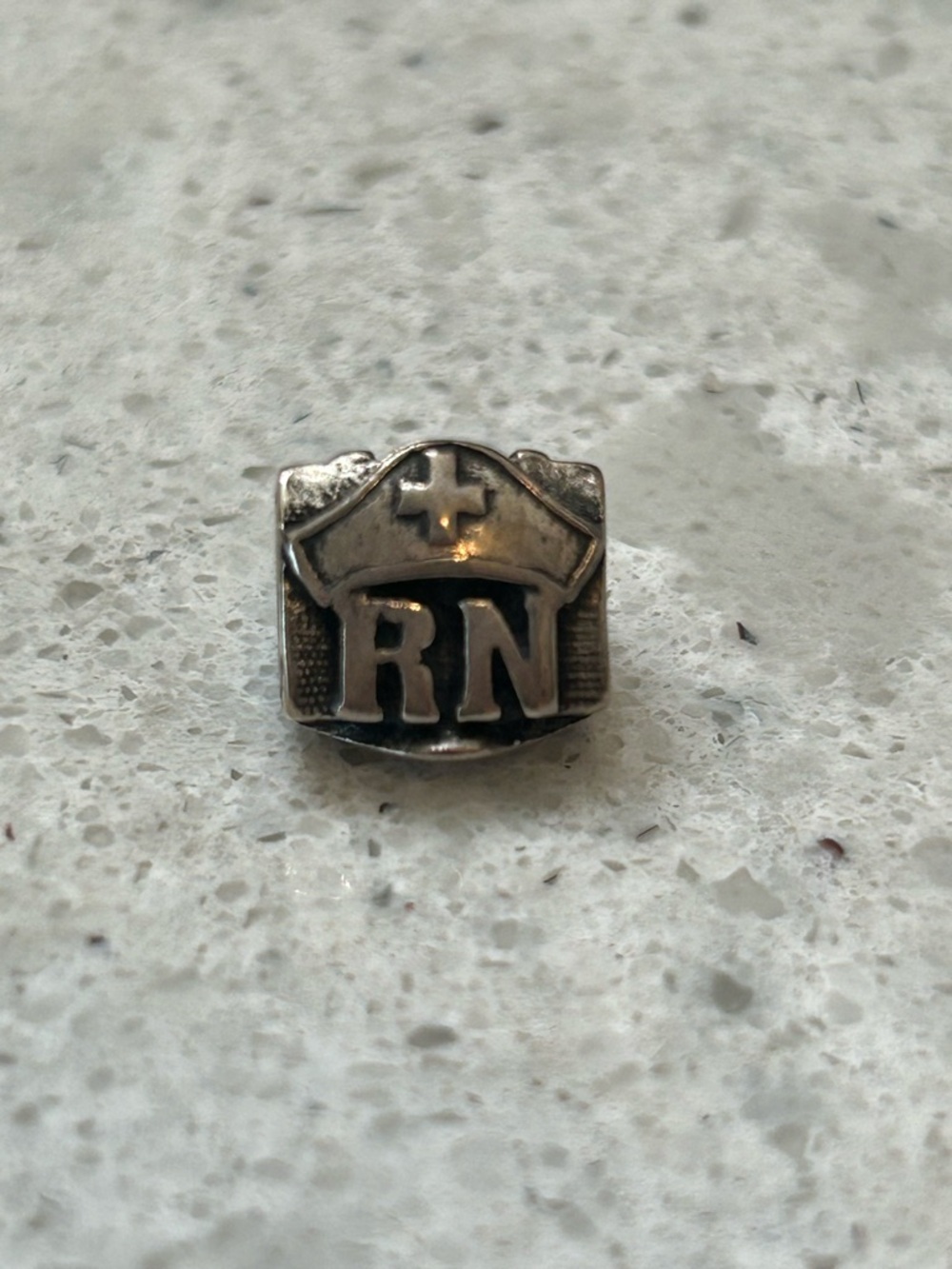 PANDORA RN CHARM. USED.